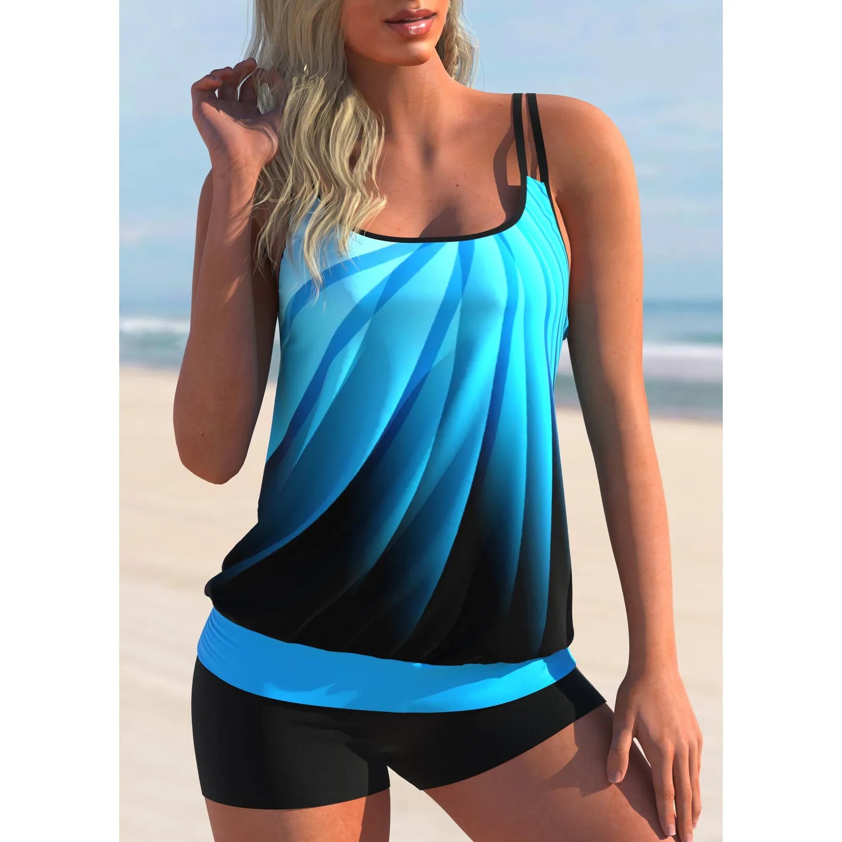Plus size women's swimsuit with printed butterfly strap top and matching conservative beach shorts