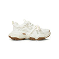 Women's beige platform sneaker with round toe and lace-up front on a white background.