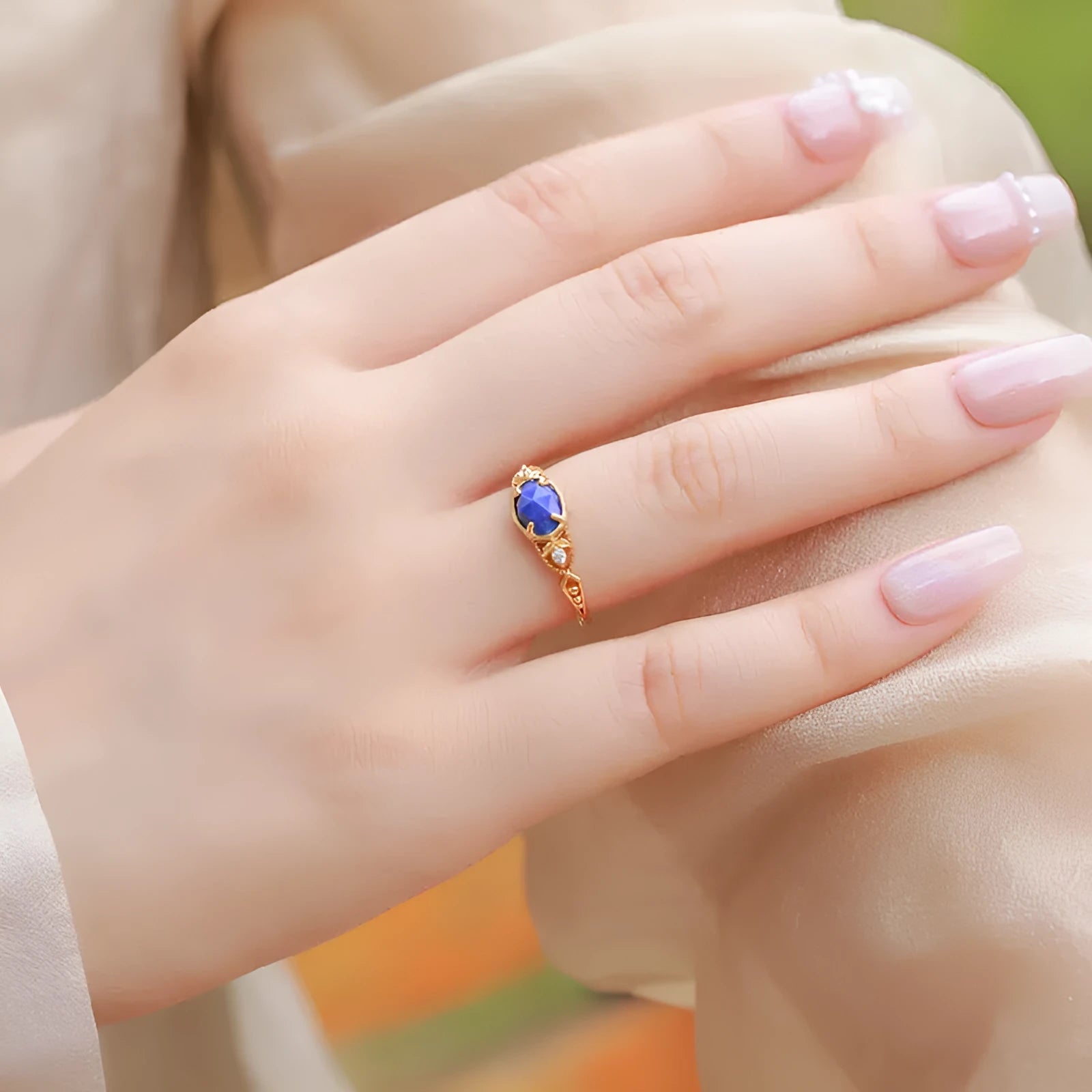 Japanese geometric lapis lazuli ring with silver setting and ellipse shape