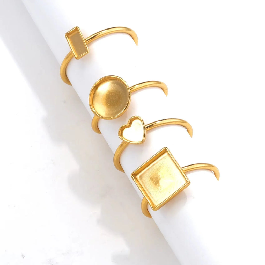 Stainless steel golden electroplated ring setting with totem pattern for DIY jewellery making.