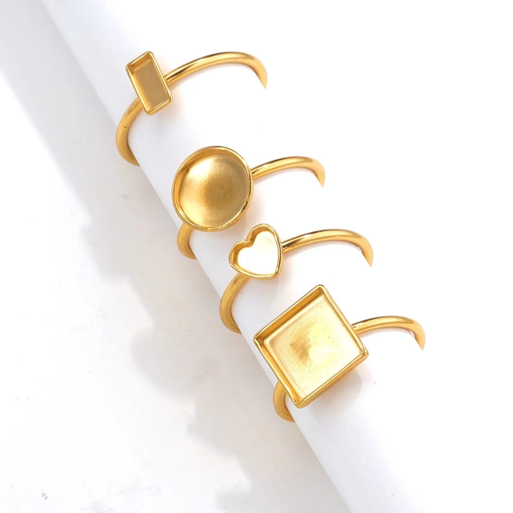 Stainless steel golden electroplated ring setting with totem pattern for DIY jewellery making.