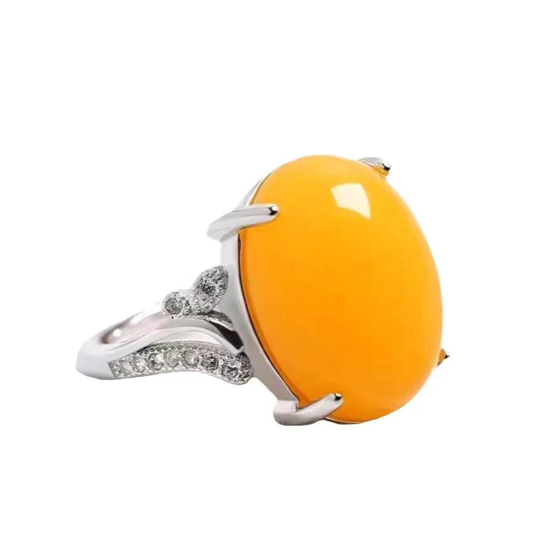 Adjustable geometric ethnic ring with a natural sapphire stone in alloy, shown in multiple colours.