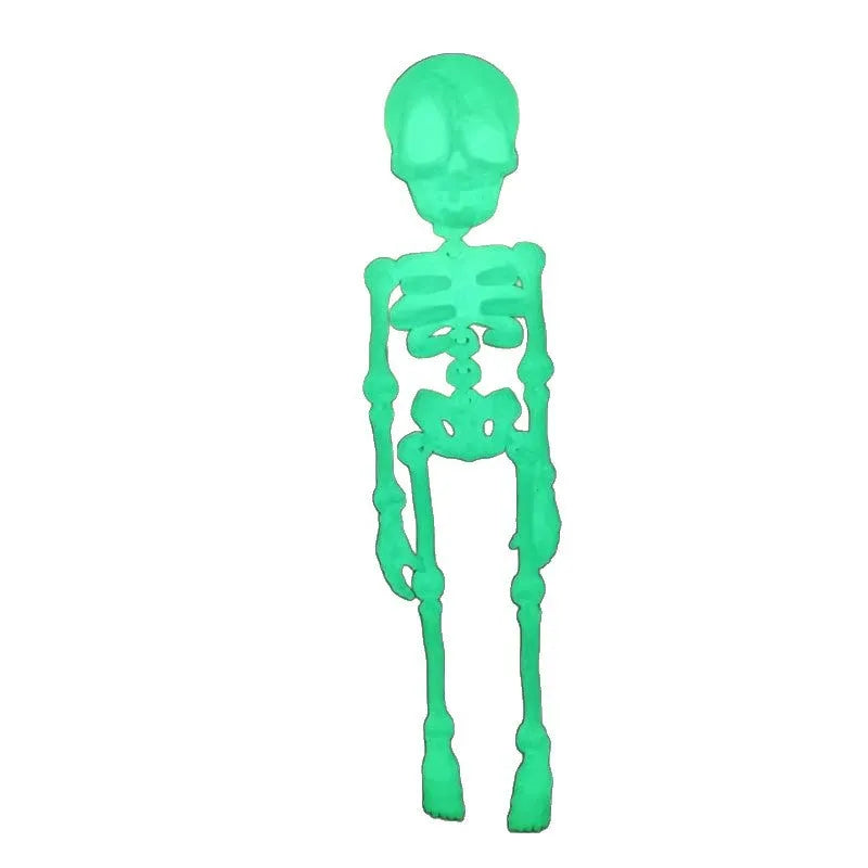 3D-printed PLA skull model Halloween fridge magnet ornament in luminous green colour.