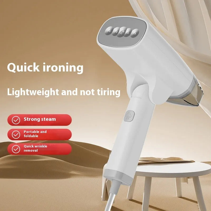 Blue and white handheld garment steamer with power cord and water tank.