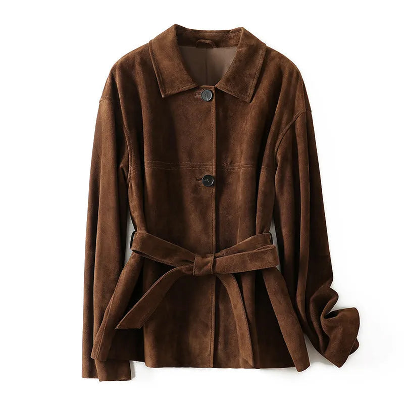 Women's caramel mocha cashmere coat with a peter pan collar and decorative leather stitching.