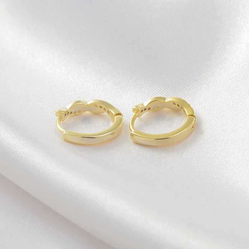 Geometric hemp rope earclip earrings in gold and silver metallic finishes