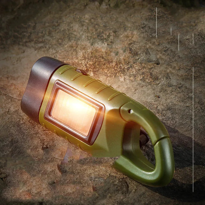 Hand-crank solar LED flashlight with USB charging port and 40mAh battery capacity