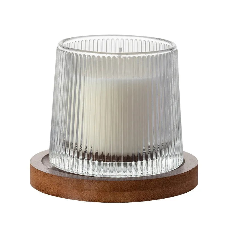 Soy wax aromatherapy candle in cup shape with rotating design, available in multiple fragrances
