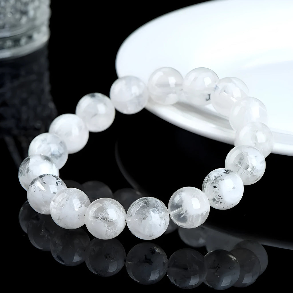 Crystal bracelet with natural blizzard pattern showing Ruyi and Xiangyun elements on round beads