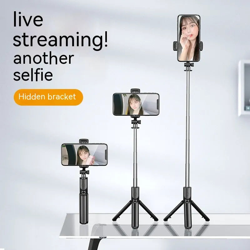 Black selfie stick tripod with wireless Bluetooth remote and universal phone holder, anti-shake floor stand.