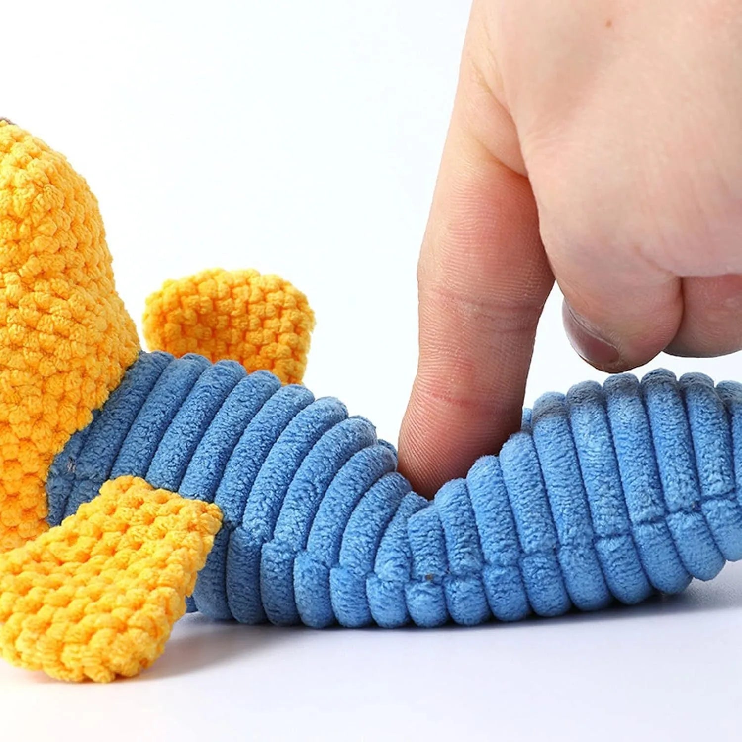 Soft cloth dog squeaky chew toy measuring 19cm by 5cm in stuffed animal shape