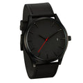 Men's casual quartz watch with black dial and black matte leather strap showing 10 o'clock and 2 o'clock positions