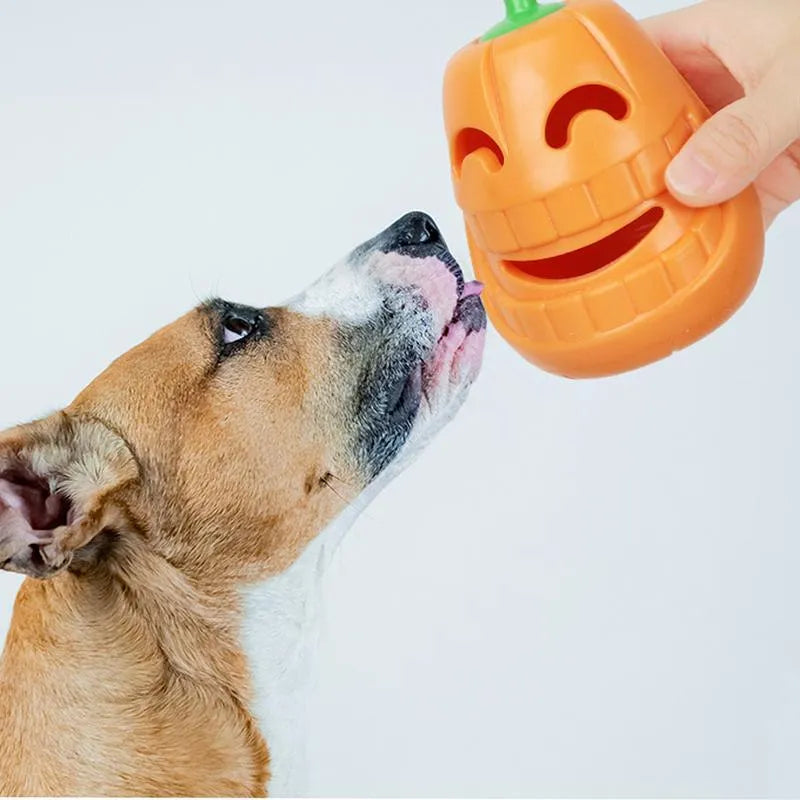 Yellow pumpkin-shaped TPR dog chew toy measuring approximately 8.6x11.5cm