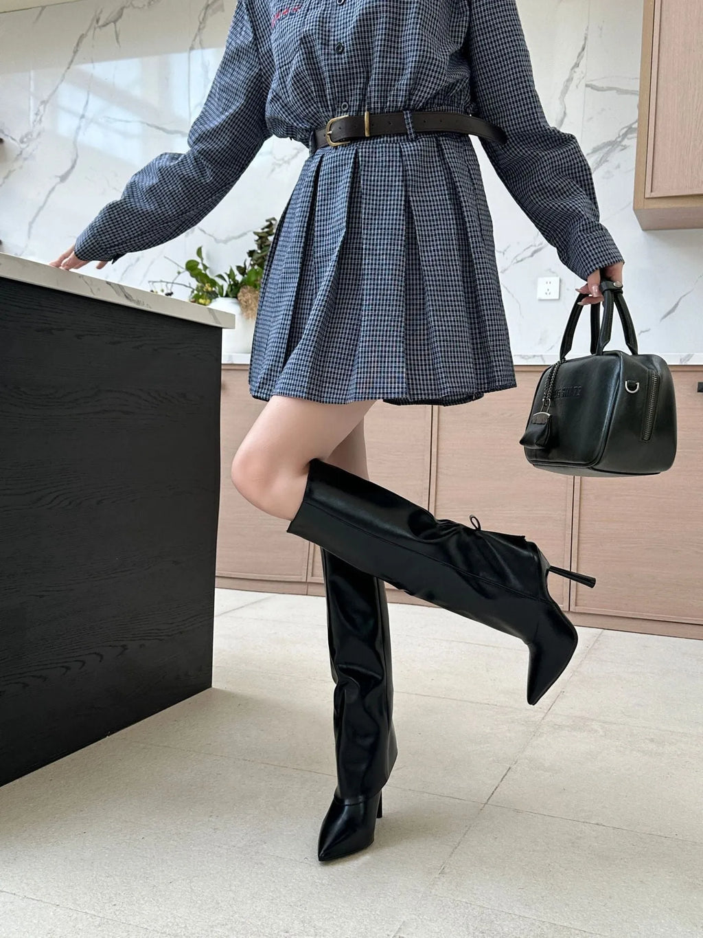 Black slimming leg warmer boots with stiletto heels and artificial PU construction
