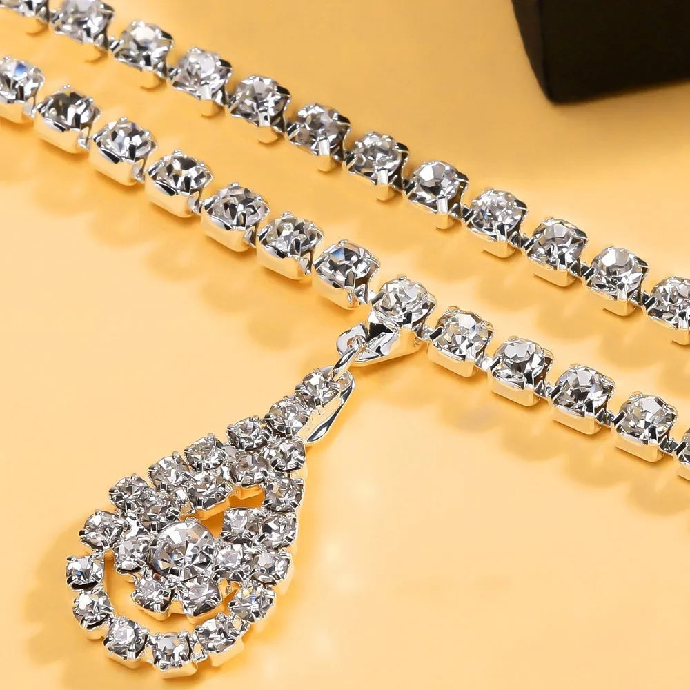 Gold or silver rhinestone waist chain with water drop pendant and lobster clasp closure