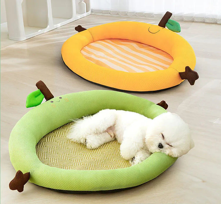Green fruit backrest pet nest mat for dog or cat on floor.