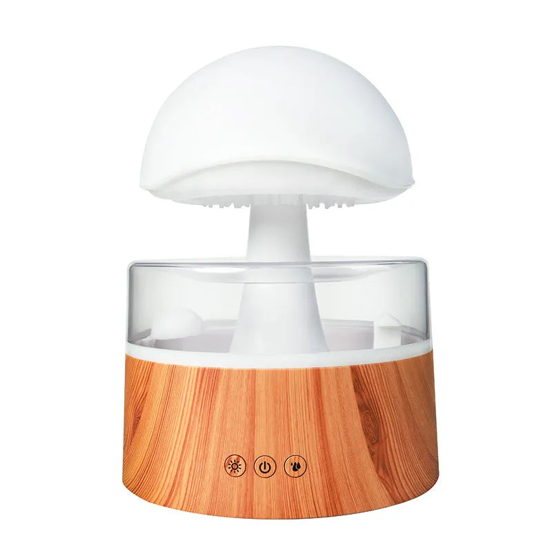 White cloud-shaped humidifier and aroma diffuser with LED lights and simulated raindrops.