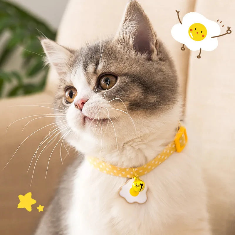 Green adjustable cat collar with bell pendant and bow tie attachment for small dogs