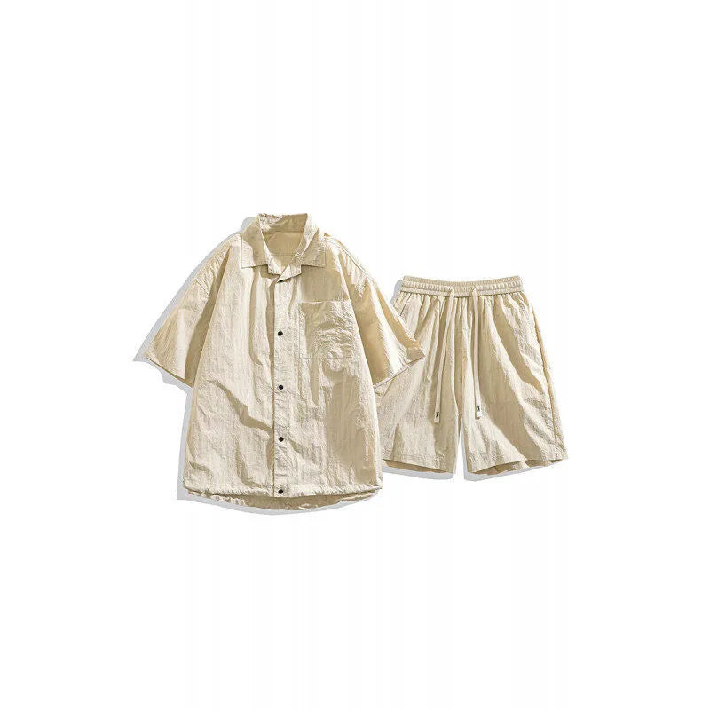 Men's dark grey loose shorts and casual shirt two-piece set made from hemp-blend fabric.
