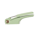 Manual garlic press in white colour with ABS plastic body and stainless steel mechanism