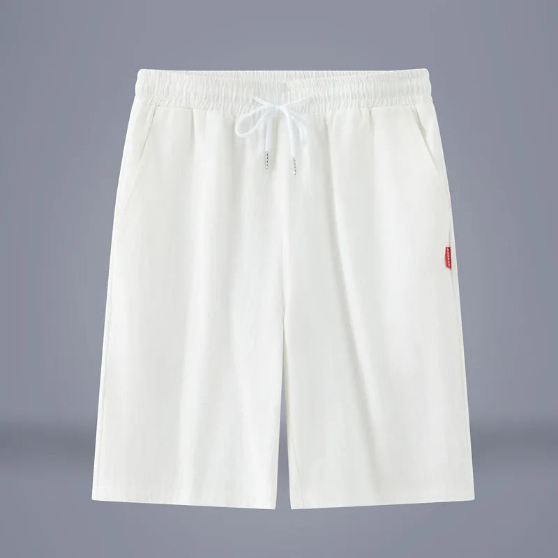 Cotton and linen cropped casual trousers in a solid colour with a drawstring waist.