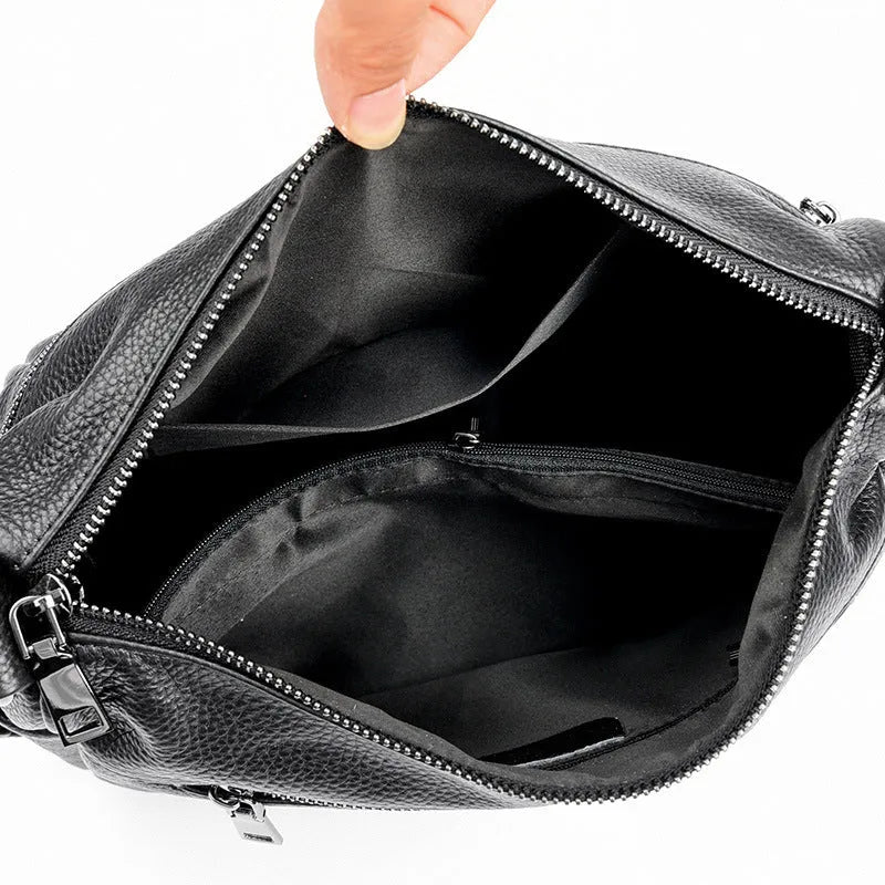 First layer cowhide genuine leather pillow-shaped shoulder messenger bag in black, small size