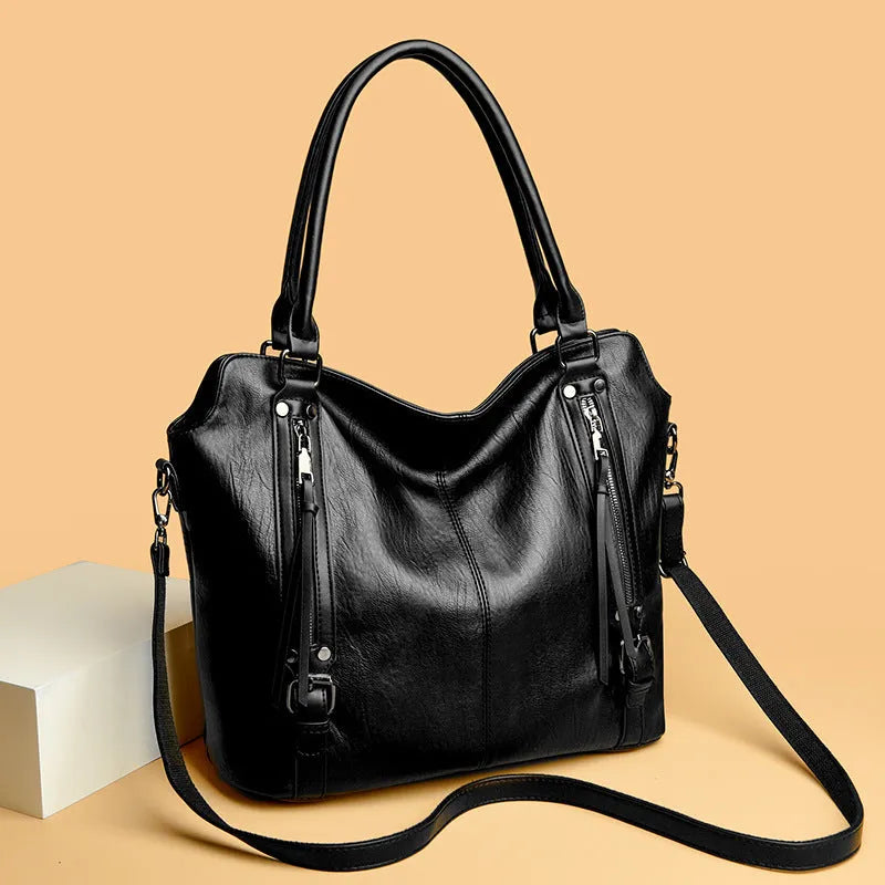 Women's large capacity PU shoulder messenger bag in black with square vertical shape and single strap