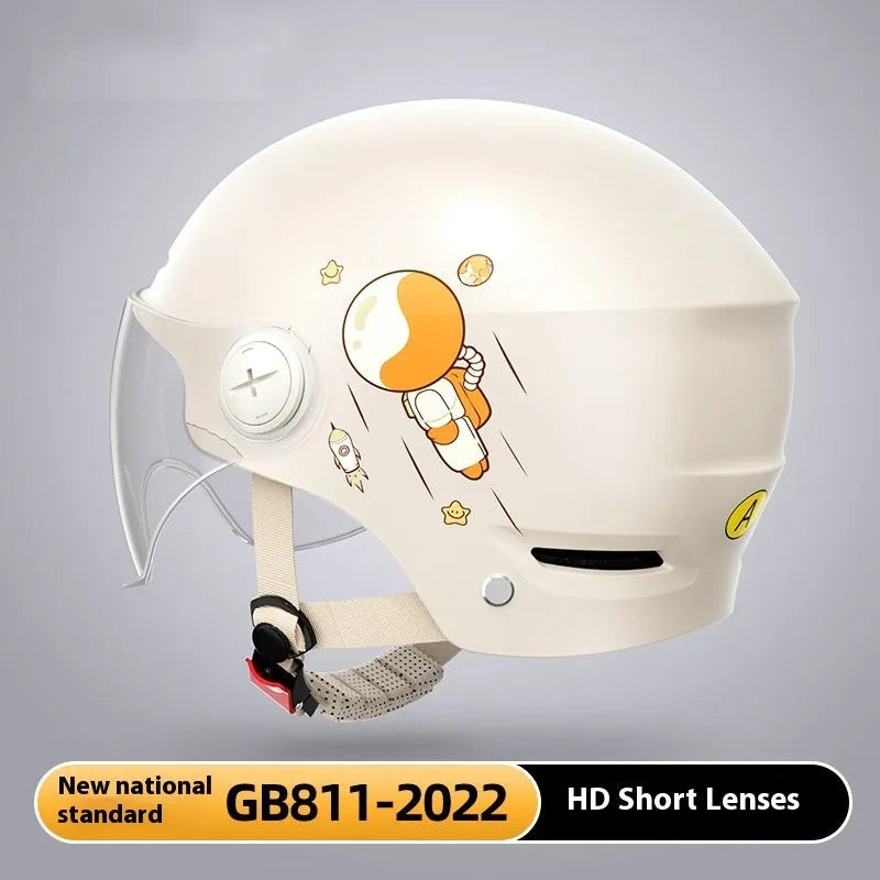 Khaki coloured electric motorcycle half helmet with a long clear visor on a grey background.