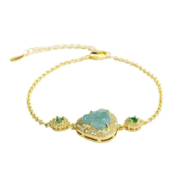 Emerald blue water jade bracelet with inlaid Maitreya Buddha carving, women's jewellery accessory.