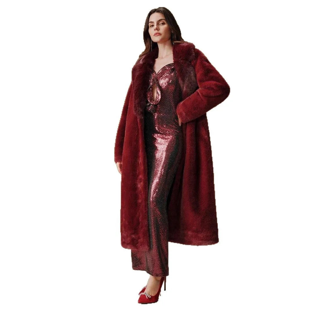 Women's lengthened faux fur coat in camel colour, showing regular sleeves and full-length design.