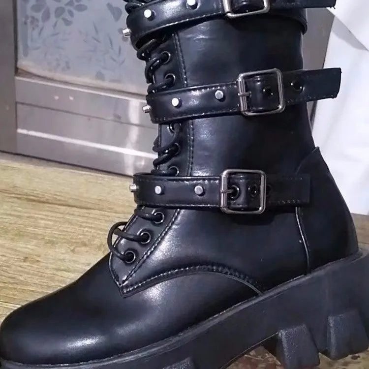 Black women's mid-calf knight boots with metal buckle straps and a side zipper.