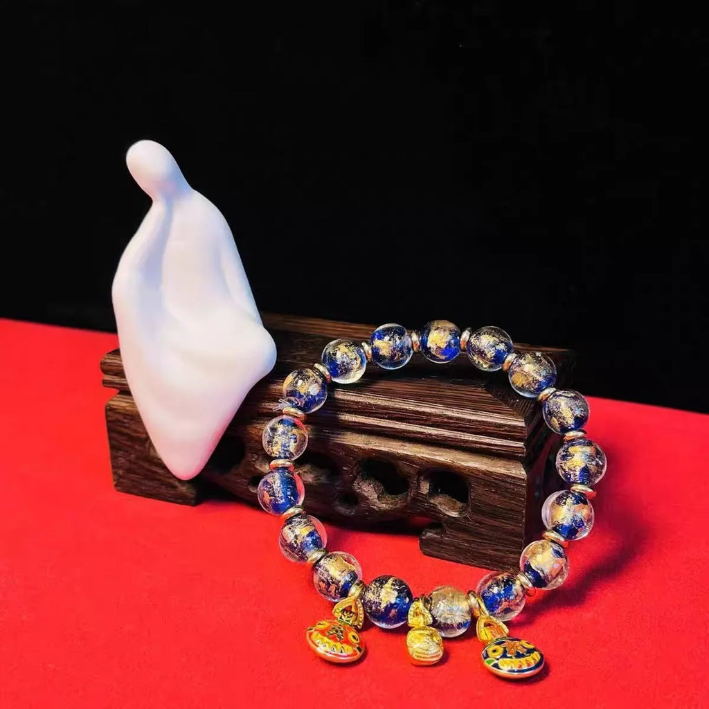 Glass bead bracelet with geometric shapes and auspicious patterns in court style design
