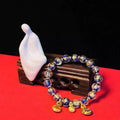 Glass bead bracelet with geometric shapes and auspicious patterns in court style design