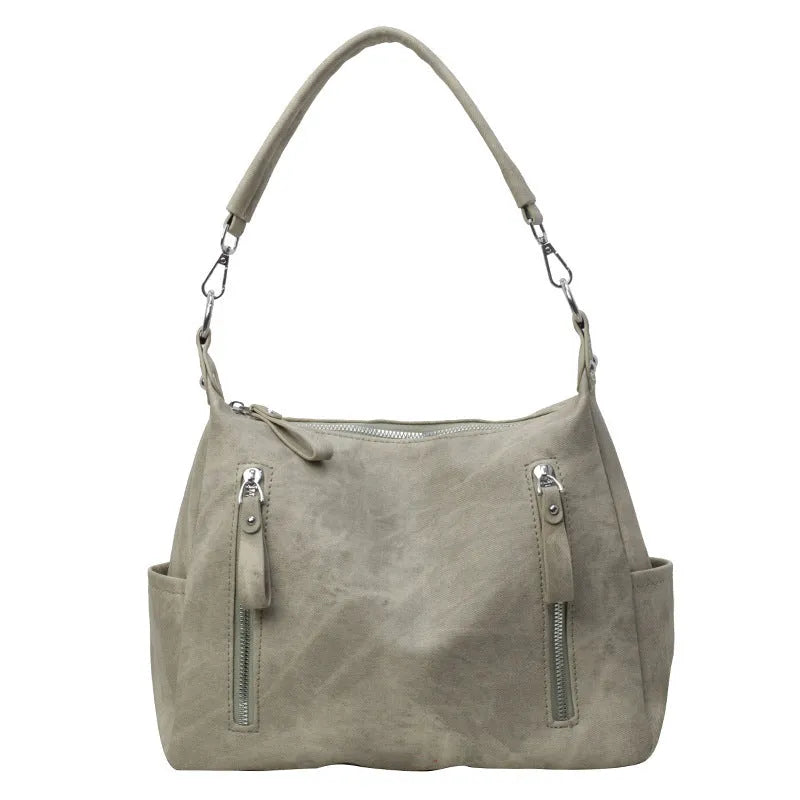 Large capacity women's casual shoulder bag in PU with sewing thread detail, available in denim blue, khaki, dark brown, light blue