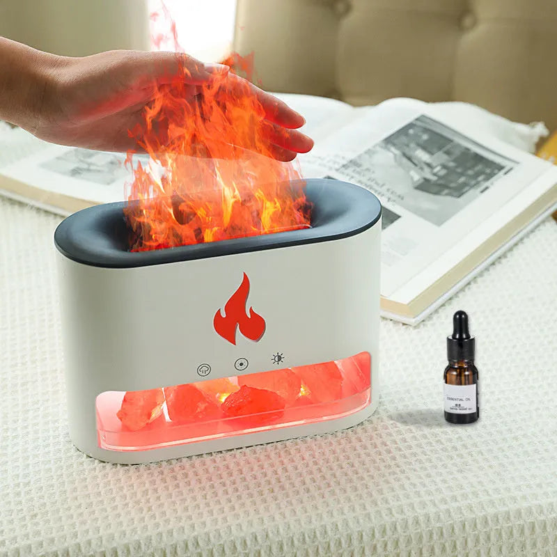Square white flame humidifier with aromatherapy diffuser and colourful simulation flame on a desktop.