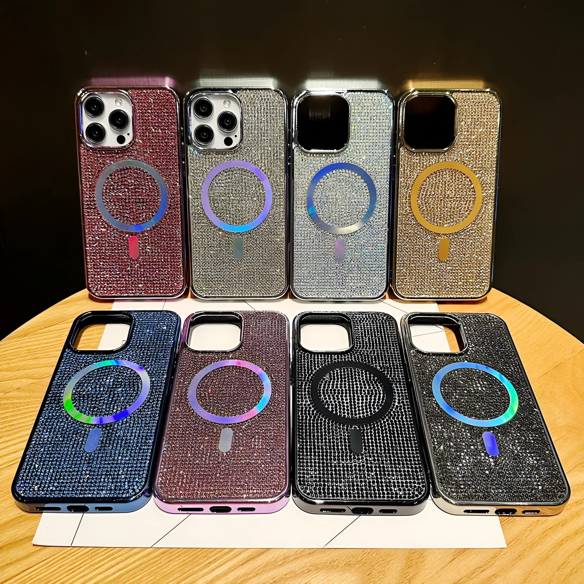 Rhinestone electroplating TPU phone case with diamond magnetic suction on a black iPhone model