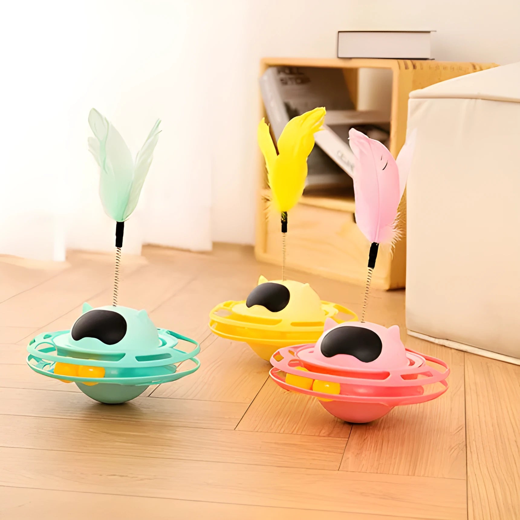 Pink cat tumbler turntable interactive toy with colourful ball inside, dimensions 17cm by 10cm