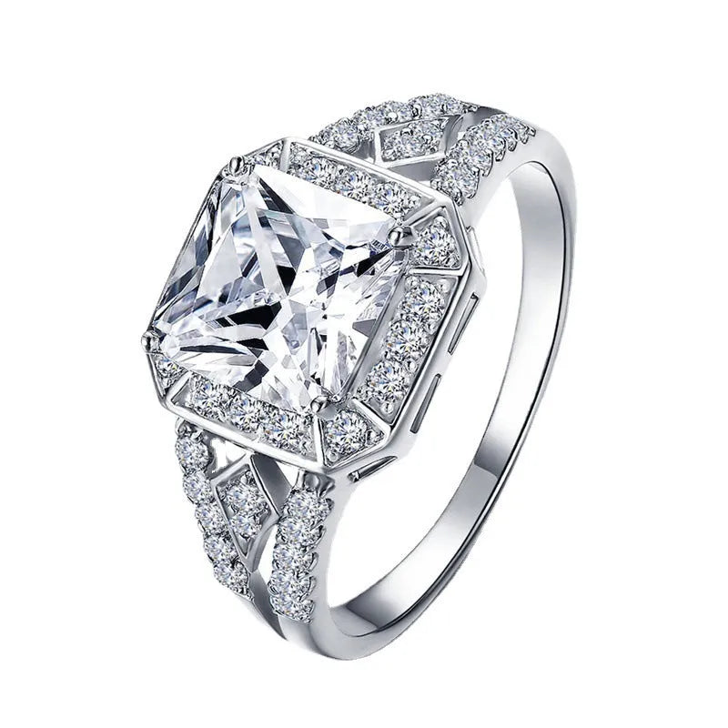 Geometric hollow women's ring with quadrilateral pattern and zircon stones in platinum finish