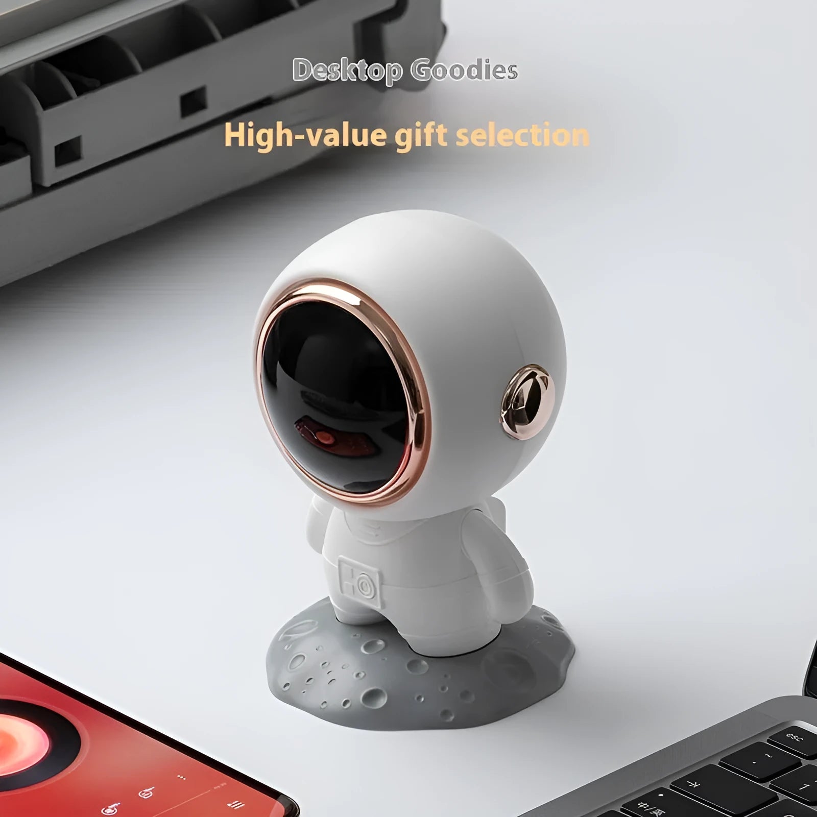 Spaceman Bluetooth speaker in moon astronaut design on desktop