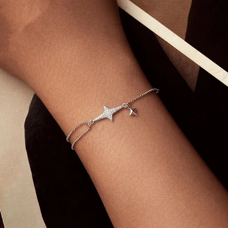 S925 sterling silver white gold plated star charm bracelet on a white background for women