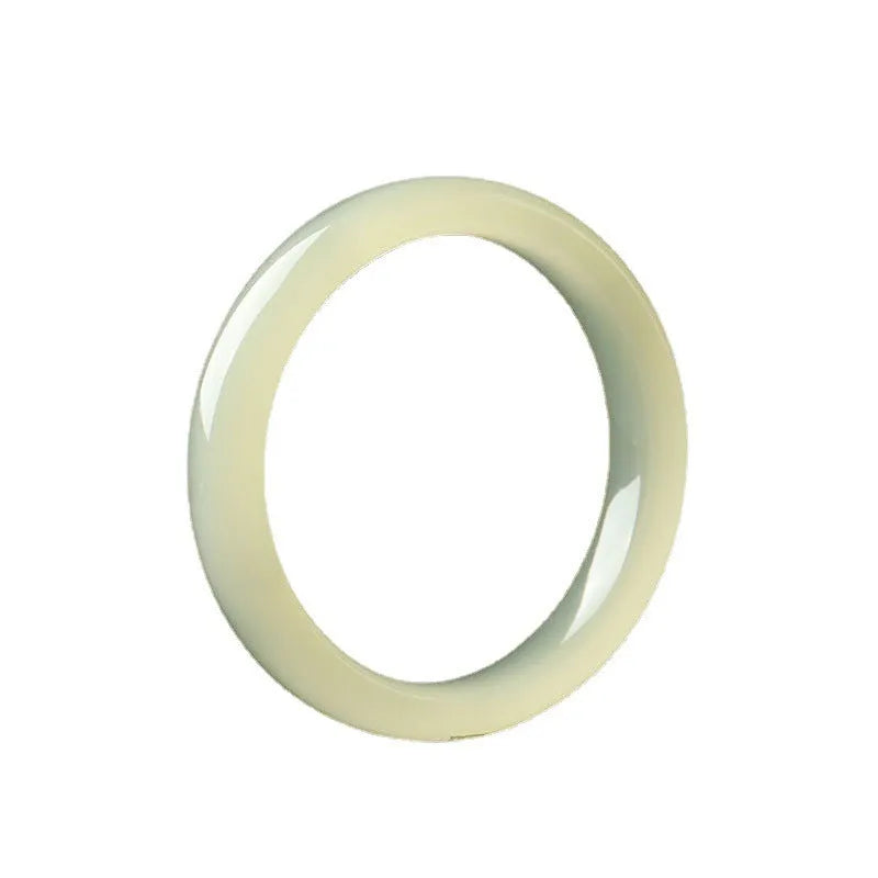 Round bar jade bracelet showing smooth geometric shape and cool stone finish.
