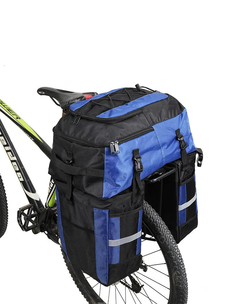 Rhinoceros 70-litre bicycle rear storage bag mounted on touring bicycle frame in blue colour option