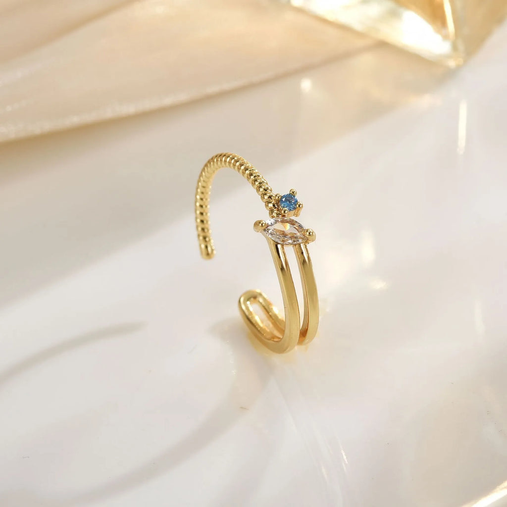 Women's geometric copper adjustable ring with electroplated finish in gold, line pattern, fashion accessory