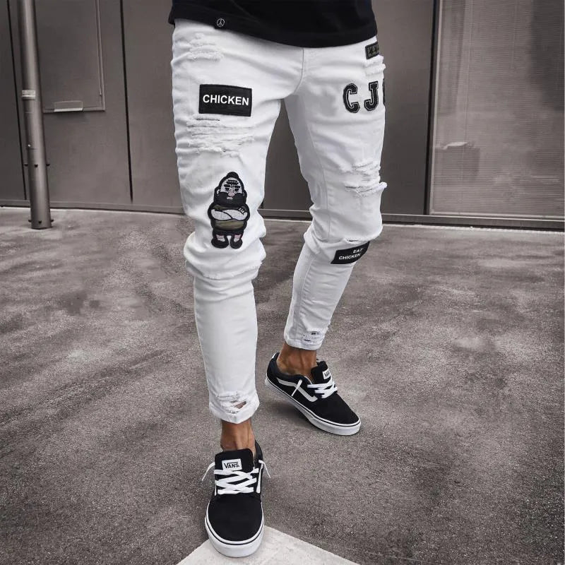 Men's slim fit embroidered jeans in blue with mid rise and zipper fly