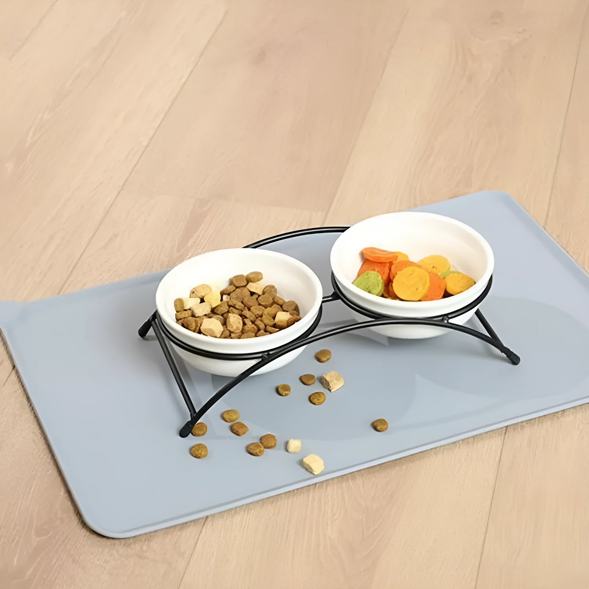 Silicone pet placemat in five colour options beneath dog food and water bowls