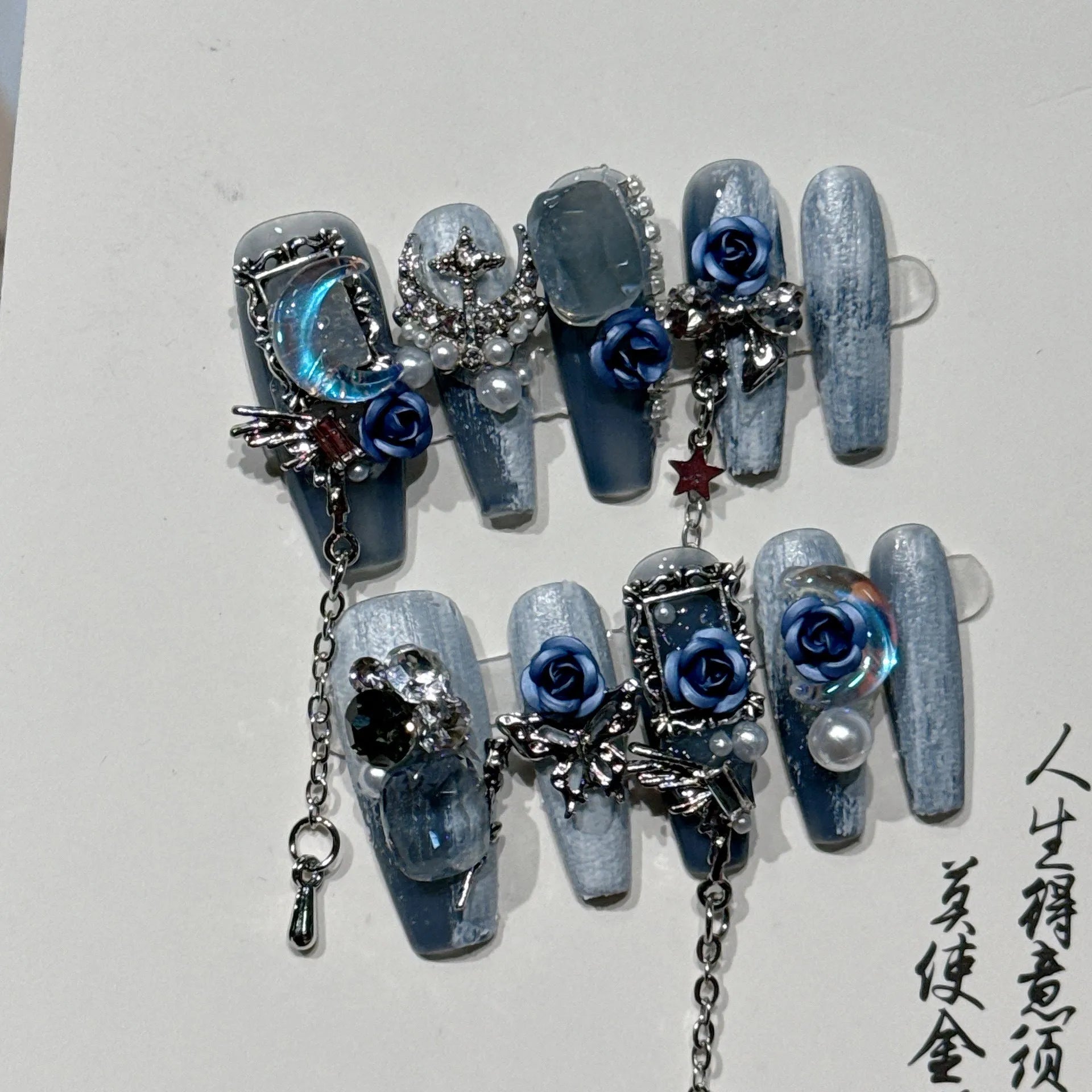 Blue night manicure set with rose and tulip patterns for ladies in four sizes