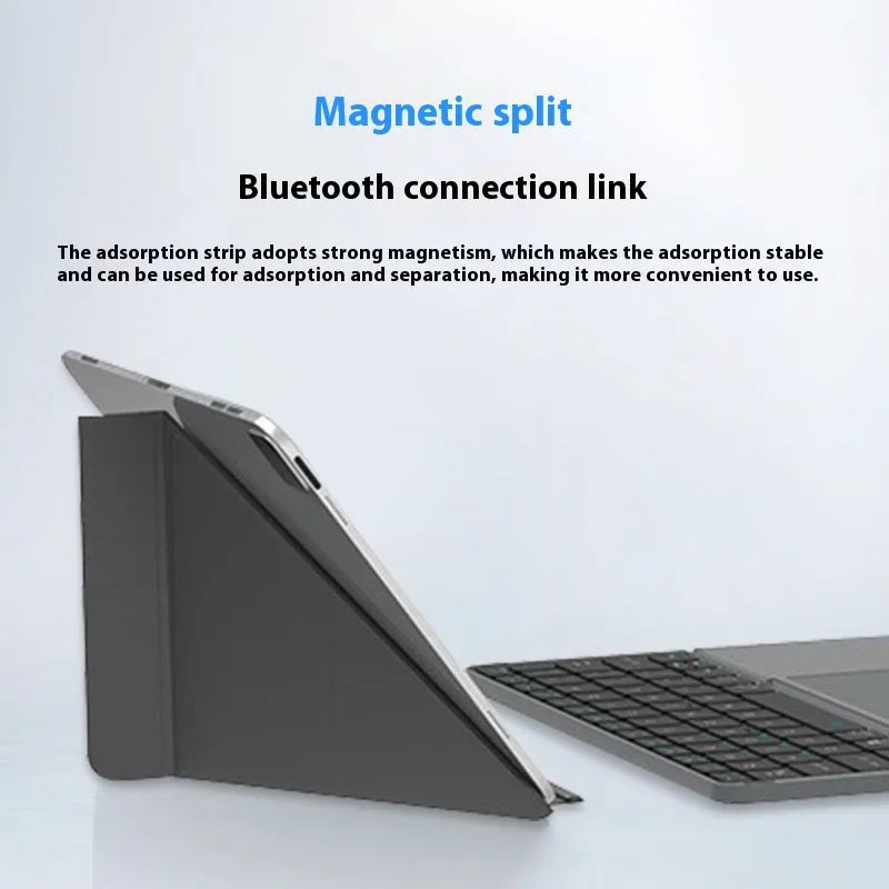 Grey wireless Bluetooth folding keyboard for smartphones and tablets showing compact portable design
