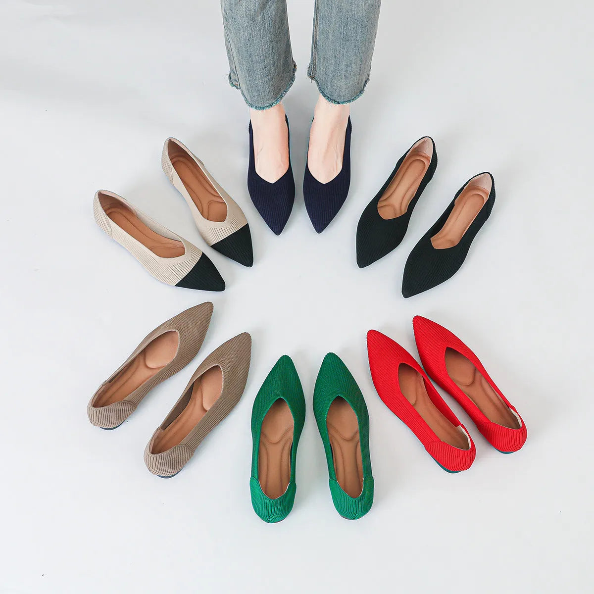 Women's apricot knit pointed toe flat ballet pumps with a rubber sole, shown from the side.