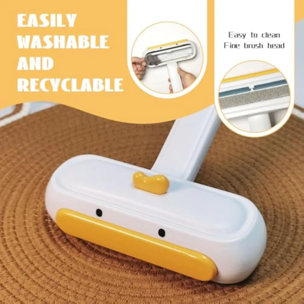Portable pet hair remover brush with yellow duck design and white plastic body