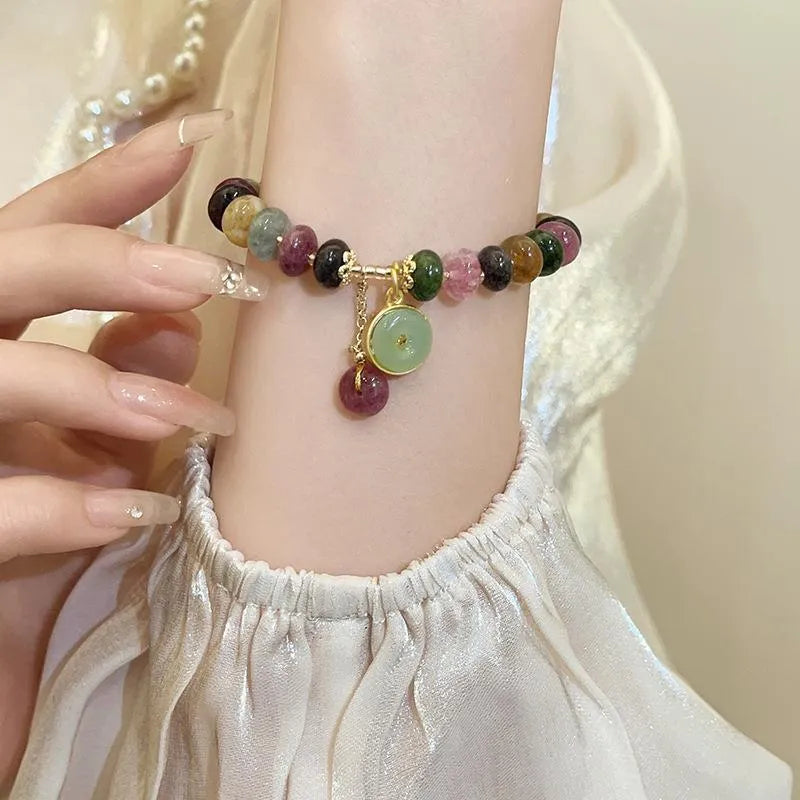 Handmade colourful tourmaline abacus bead bracelet with geometric rabbit pendant